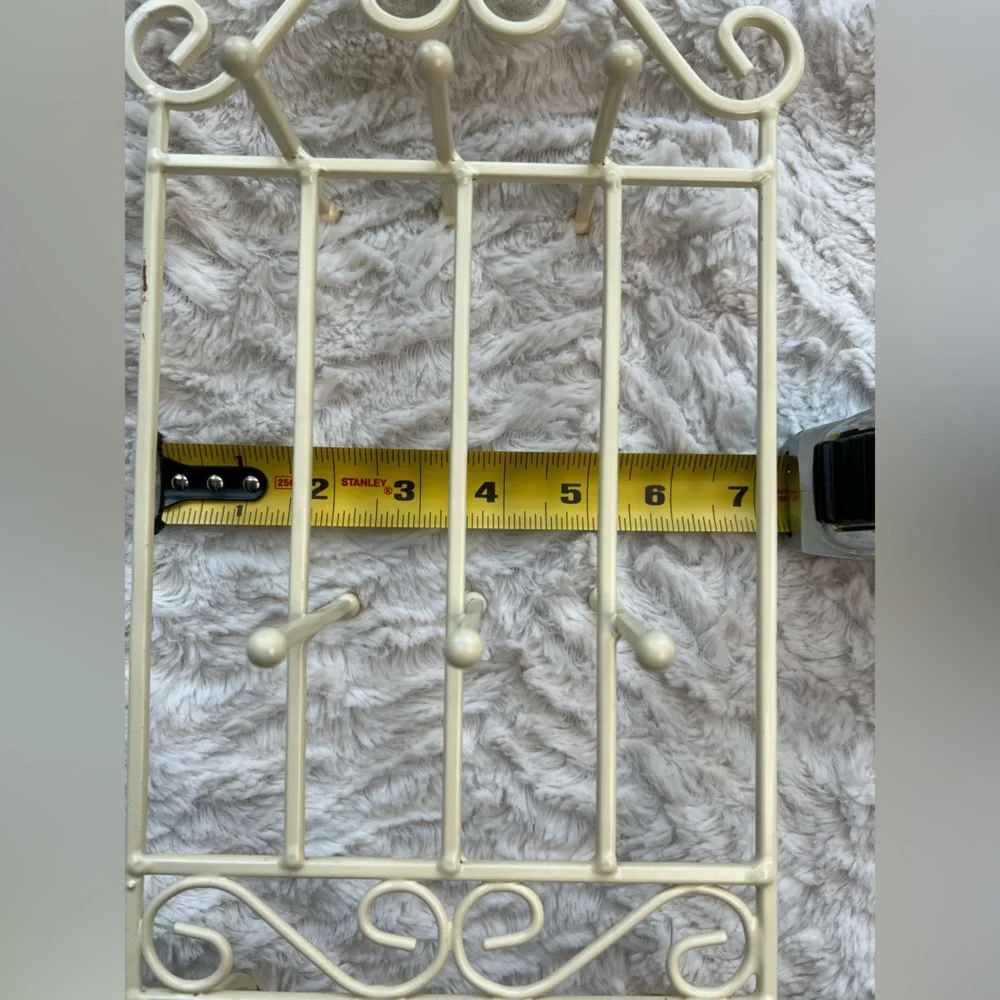 Elegant Cream Metal Wall Rack